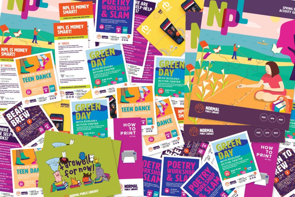 Image of a pile of colorful, bright flyers and promotional pieces for the Normal Public Library.